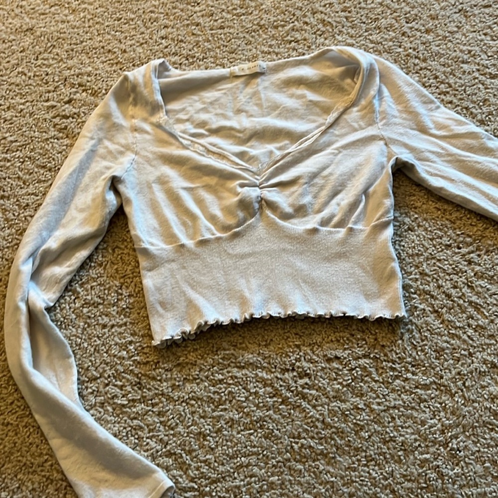 Cream colored long sleeve crop top, super cute but I have one just like this